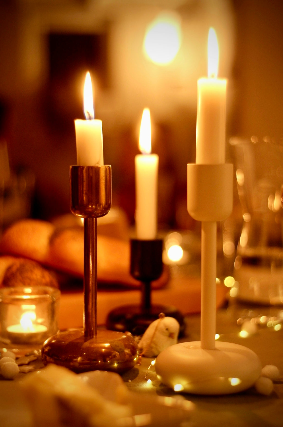 a close up of candles on a table